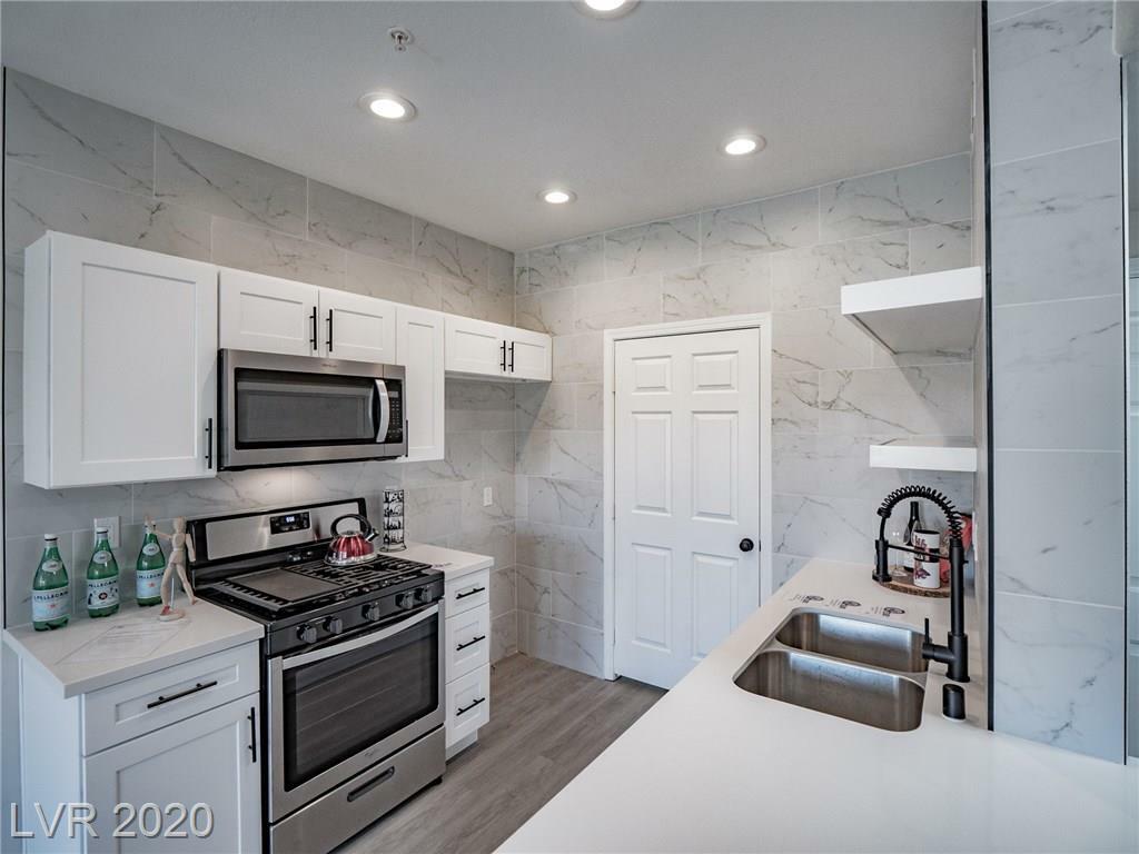 Property Photo:  7127 Durango Drive 311  NV 89113 