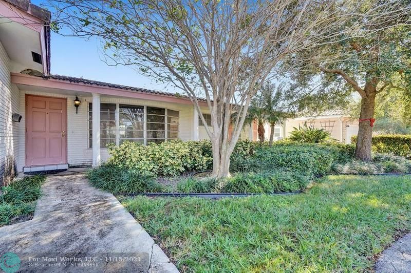 Property Photo:  5910 NE 14th Ln  FL 33334 