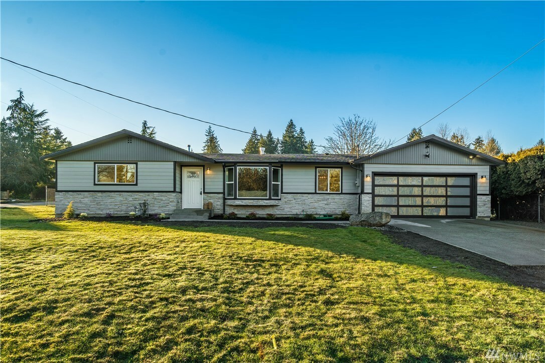 Property Photo: 9322 Woodland Ave E WA 98371