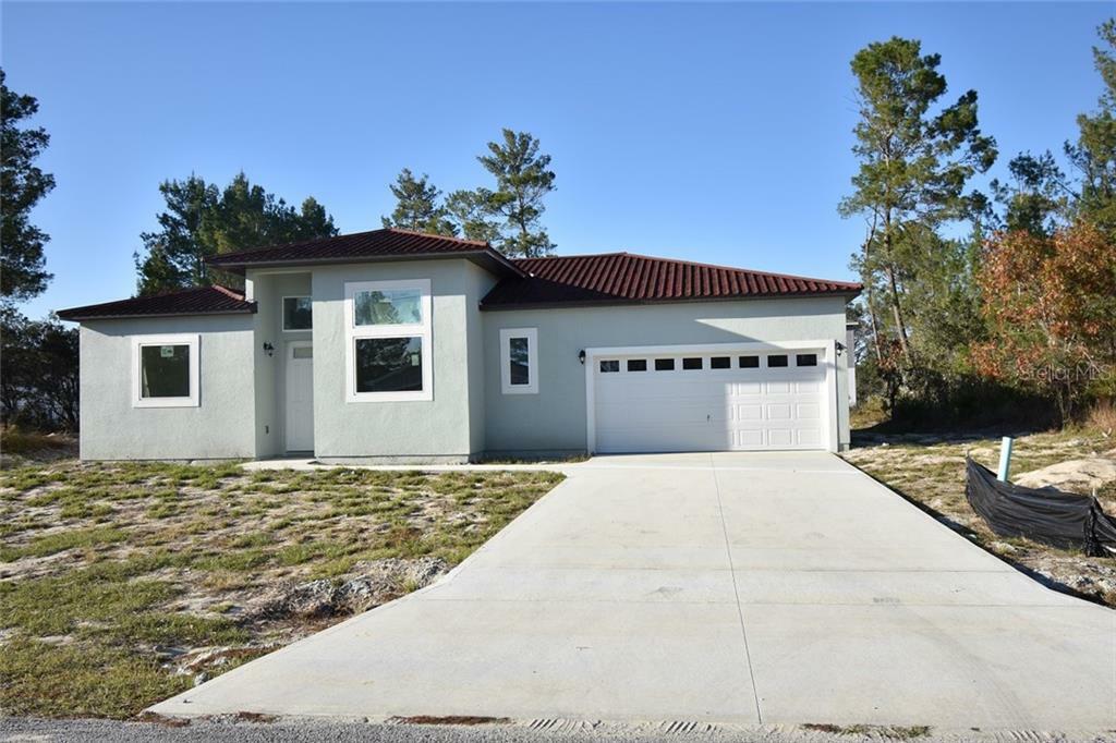 Property Photo:  221 Gladiola Court  FL 34759 