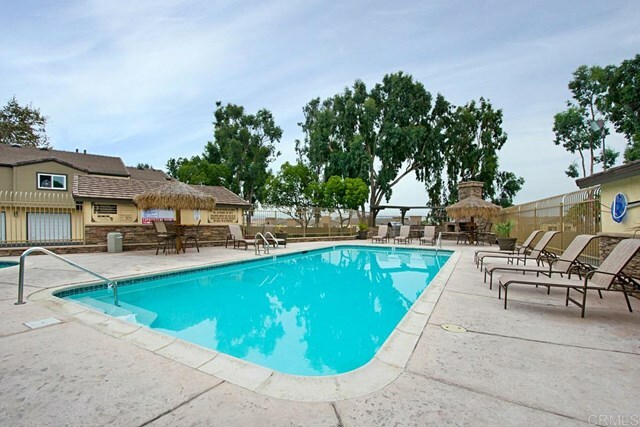 Property Photo:  5009 Los Morros Way 17  CA 92057 