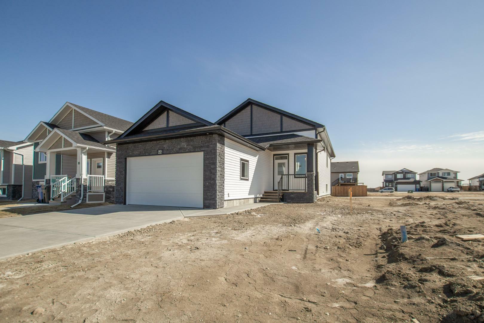 Property Photo: 22 Rivergrove Run W AB T1K 8E8