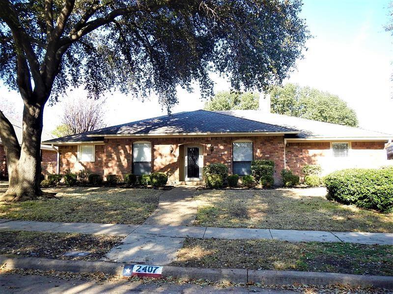 Property Photo: 2407 Honeysuckle Drive TX 75082