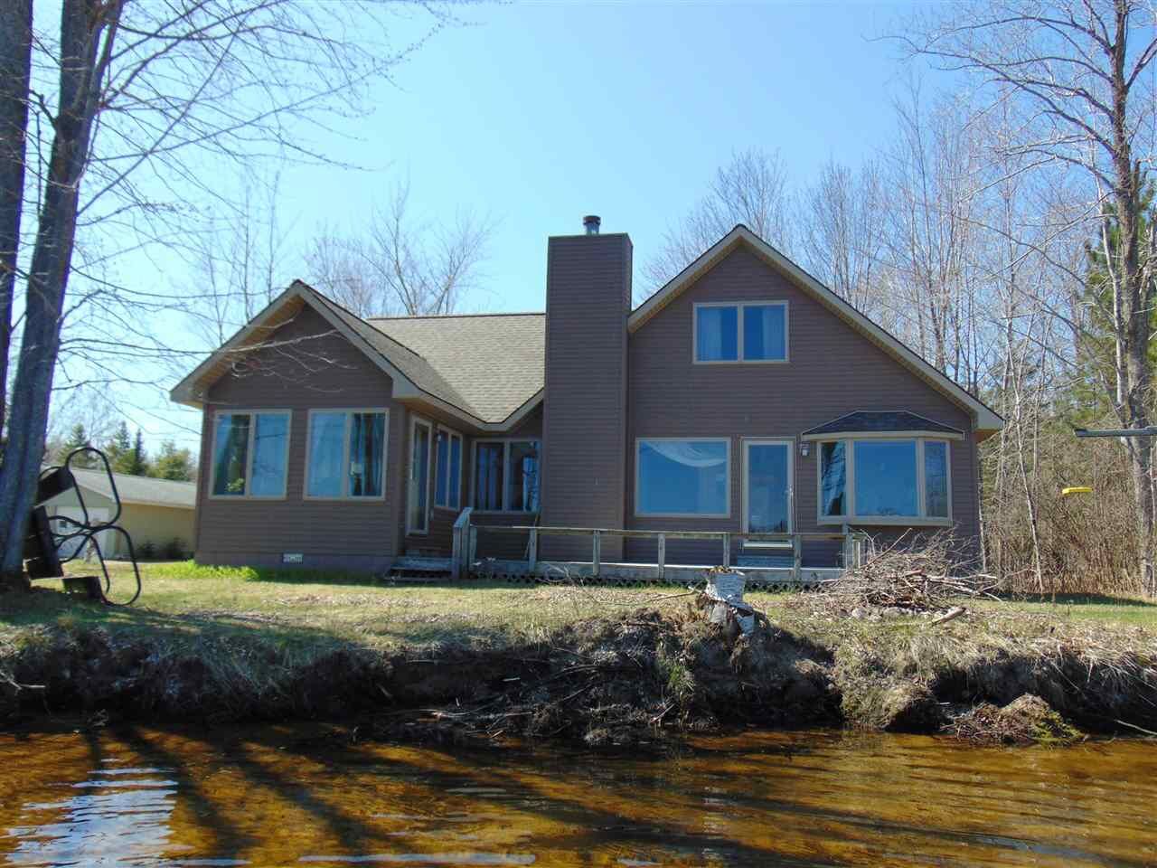 Property Photo:  9650 Silver Strand  MI 49755 