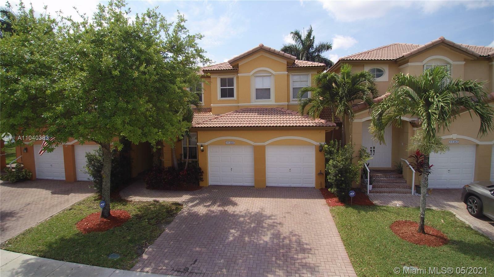 Property Photo:  11358 NW 83 Way  FL 33178 