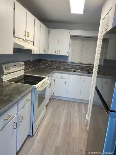 Property Photo: 6130 W 21st Ct 304 FL 33016