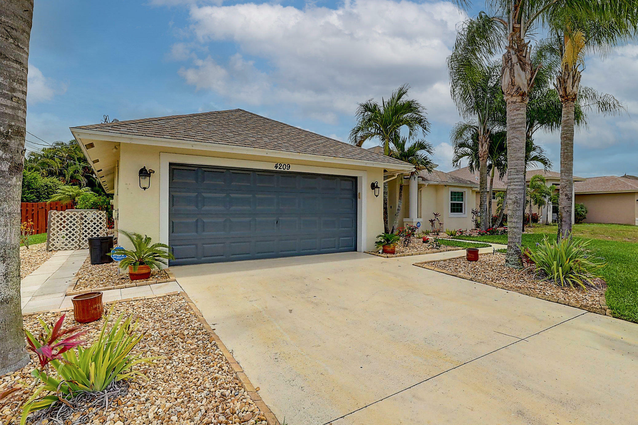Property Photo: 4209 SW Xenon Street FL 34953