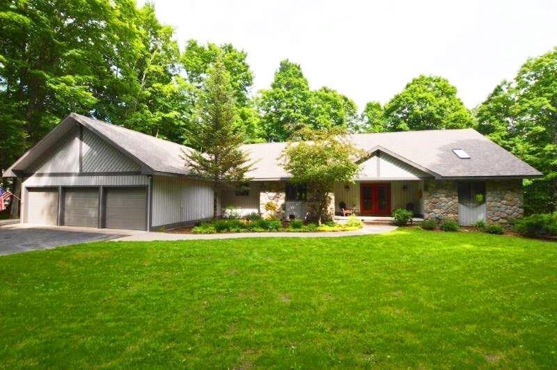 Property Photo:  11491 Bridle  MI 49706 