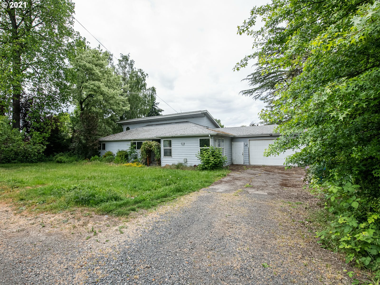 Property Photo:  267 NE South Shore Rd  OR 97211 