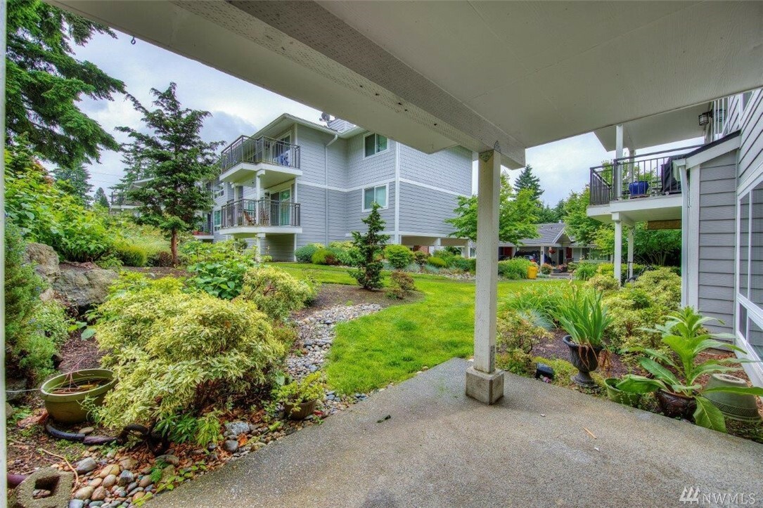 Property Photo:  15212 NE 8th St F13  WA 98007 