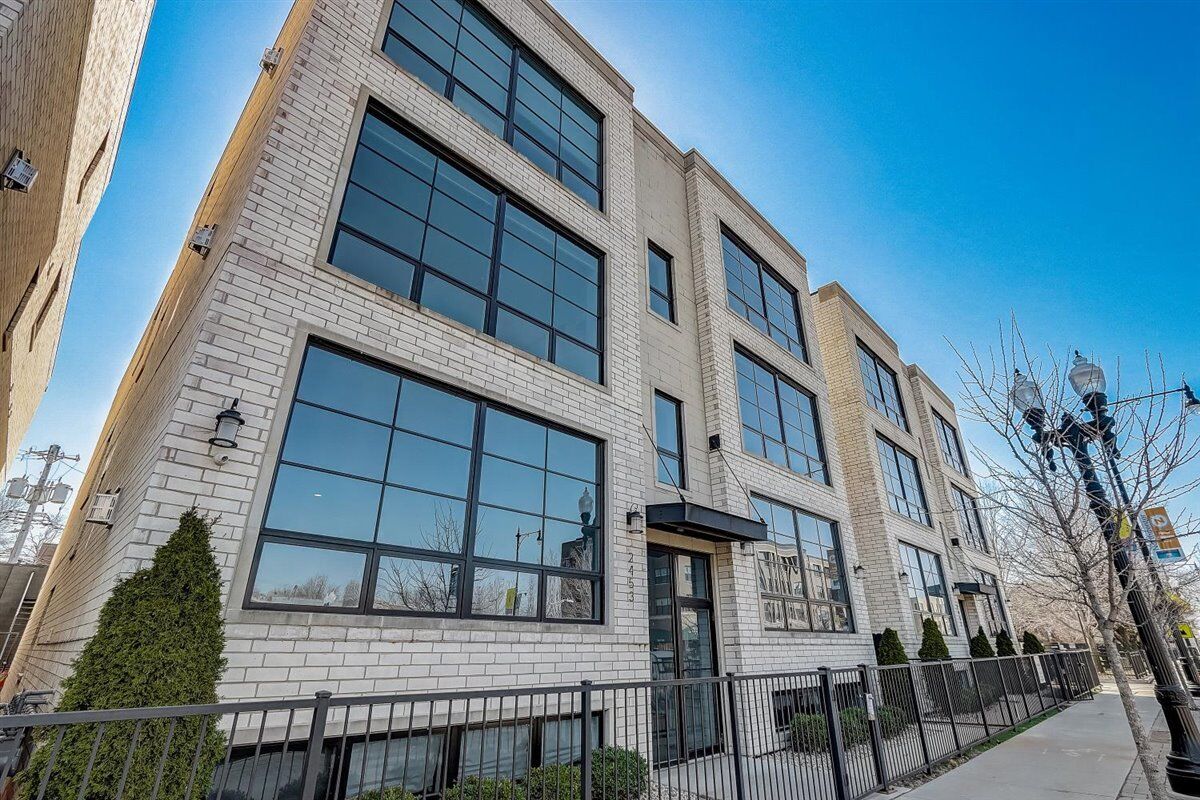 Property Photo: 2453 W Irving Park Road 1W IL 60618