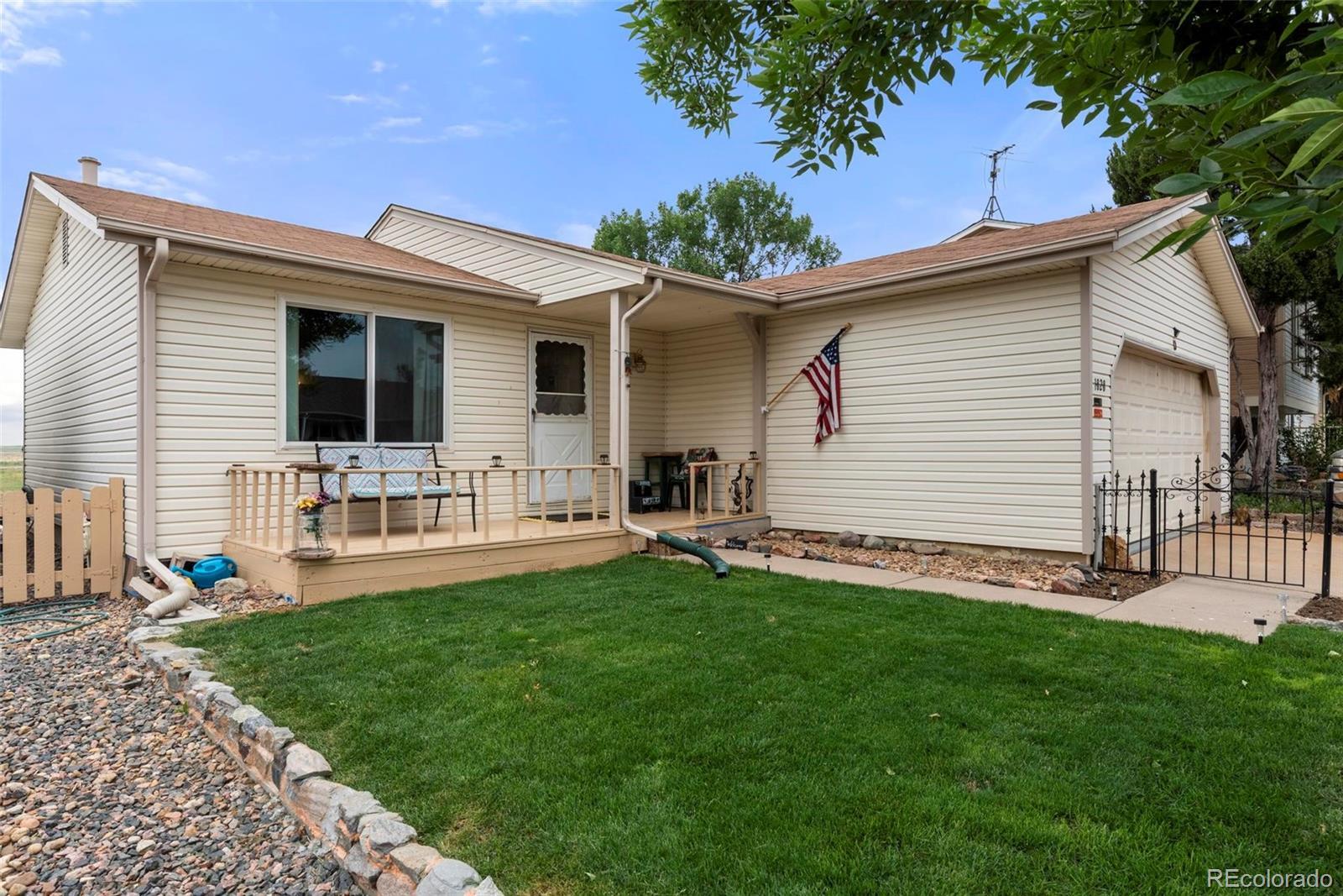 Property Photo: 1828 S Genoa Street CO 80017