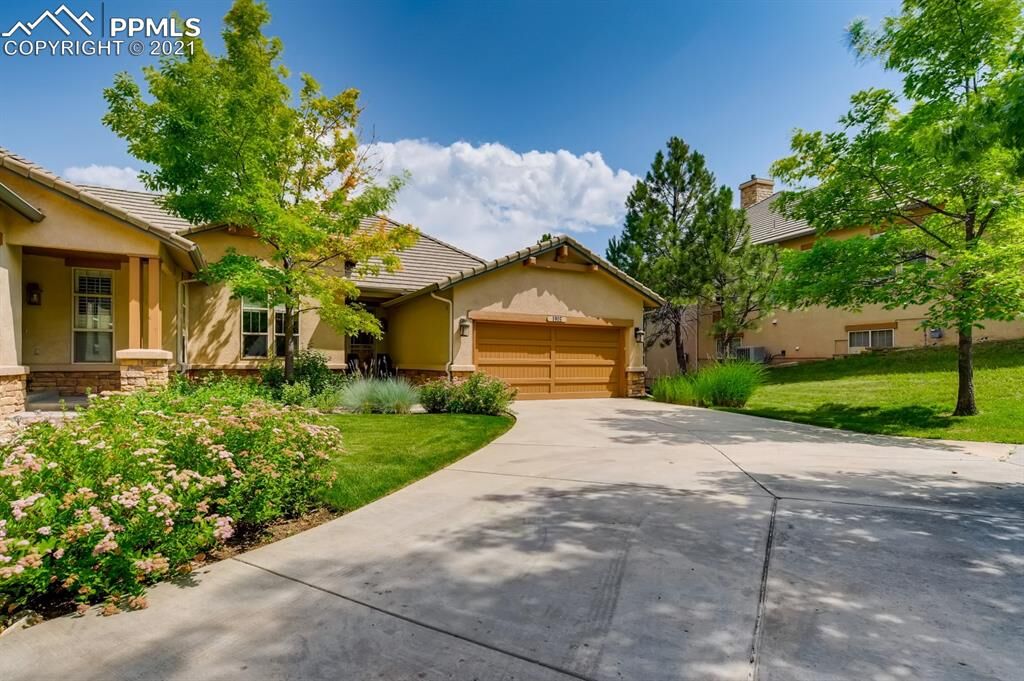 Property Photo:  1915 Pine Mesa Grove C  CO 80918 