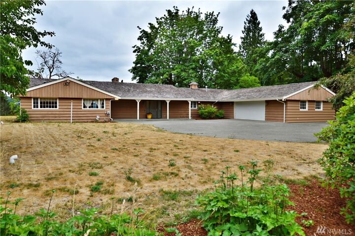 Property Photo: 3415 Scenic Dr SE WA 98092
