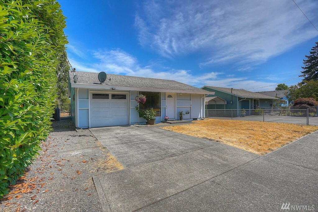 Property Photo:  6943 S Madison St  WA 98409 