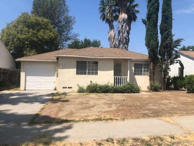 Property Photo:  7051 Garden Grove Avenue  CA 91335 