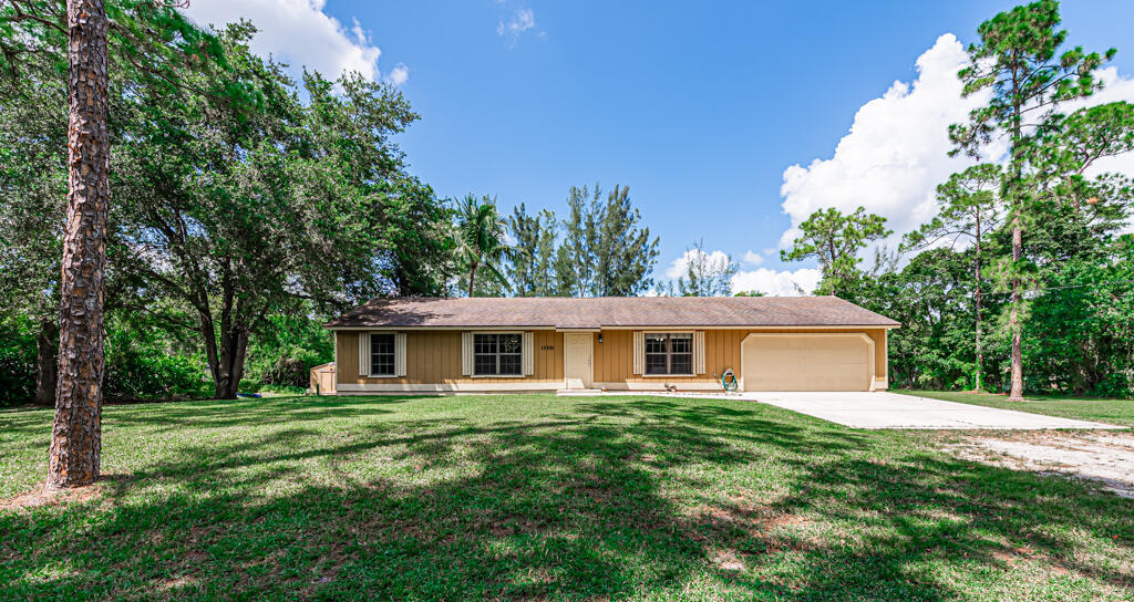 Property Photo: 15391 80th Lane N FL 33470