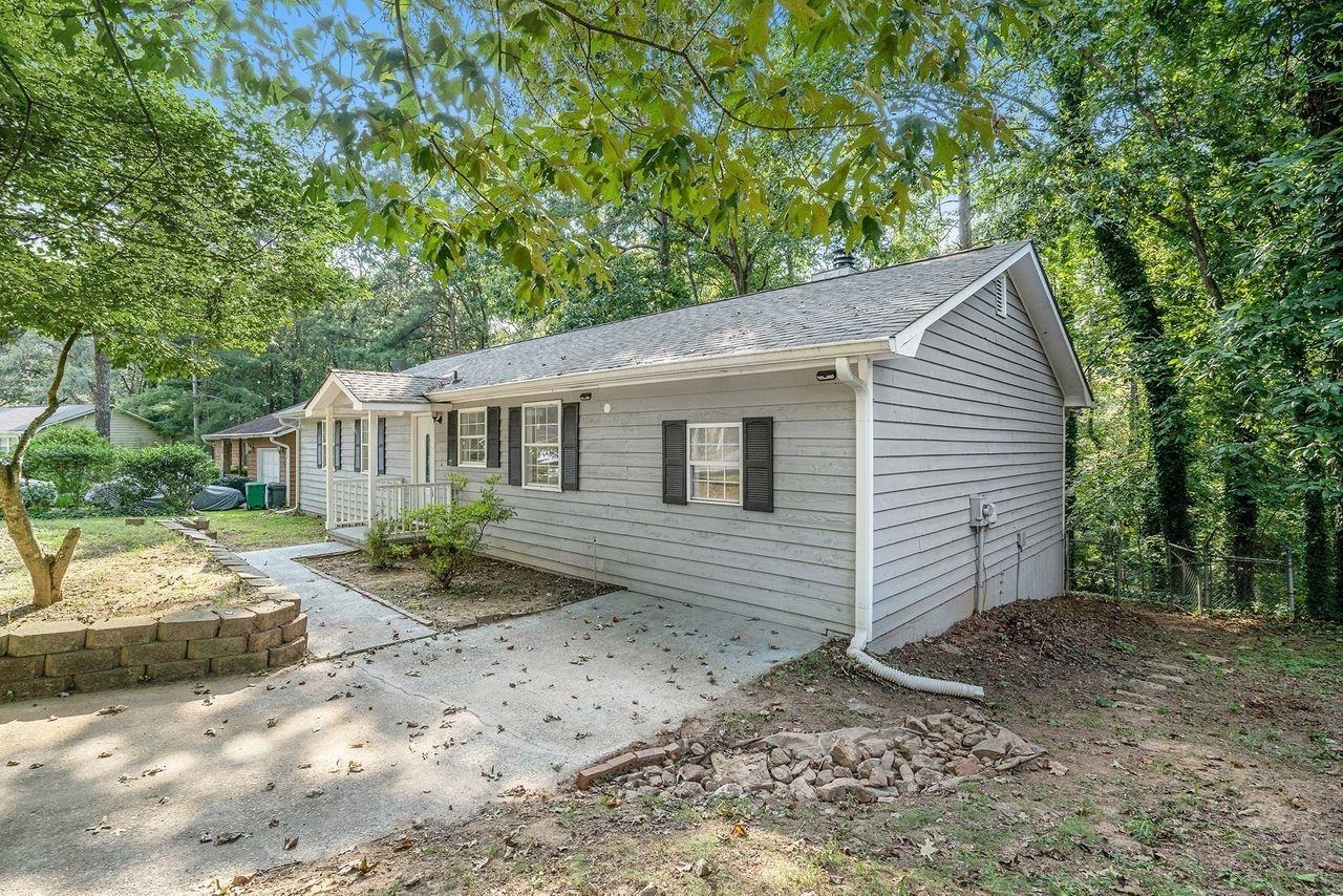 Property Photo:  1393 Red Cedar Trail  GA 30083 