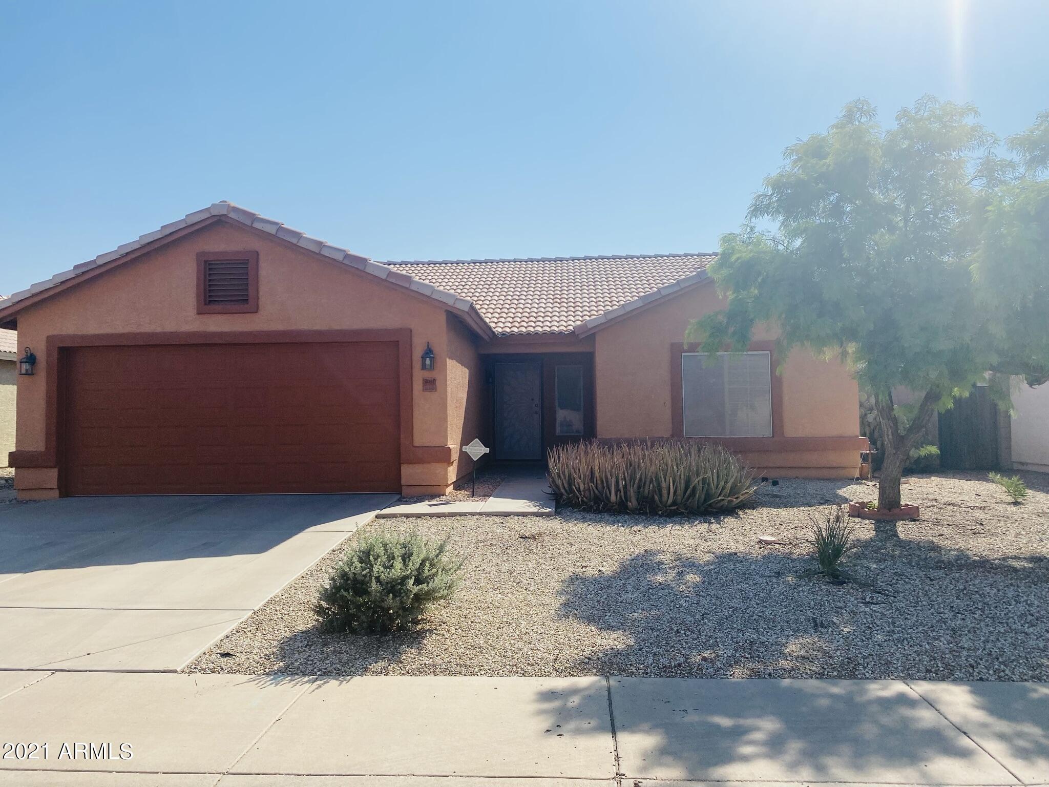 Property Photo: 2037 N 115th Lane AZ 85392
