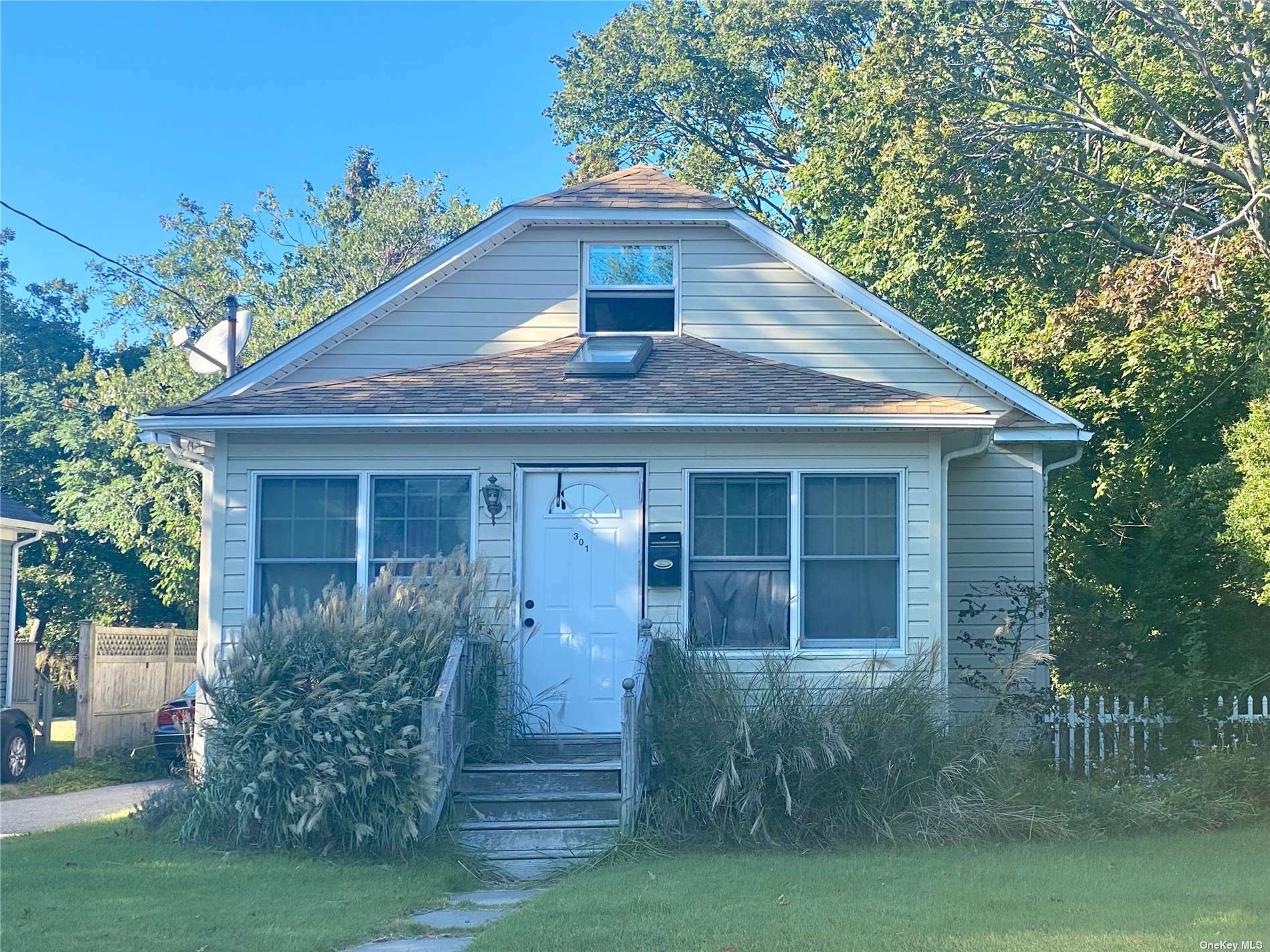 Property Photo:  301 Oak Street  NY 11772 