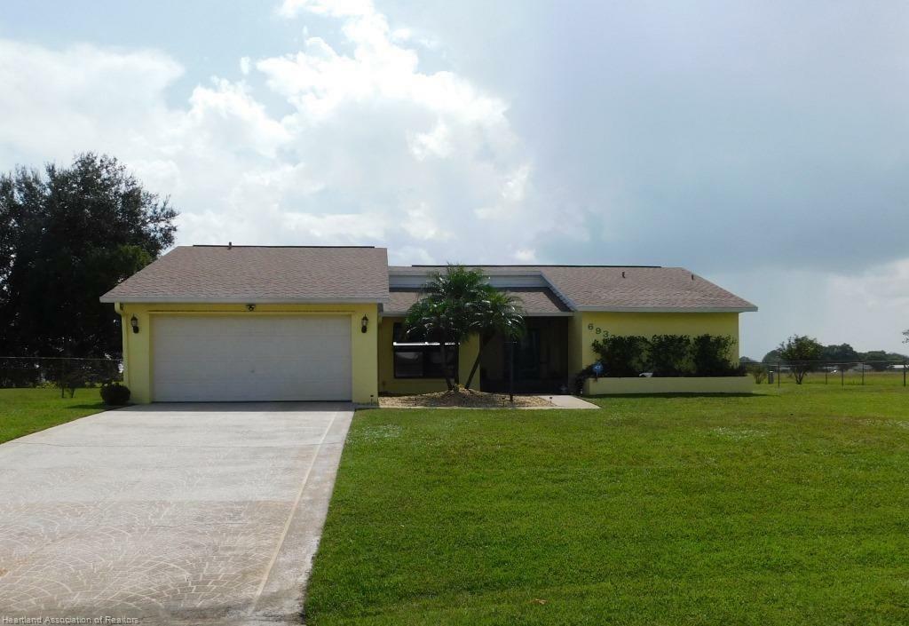 Property Photo:  6932 Kenwood Place  FL 33876 