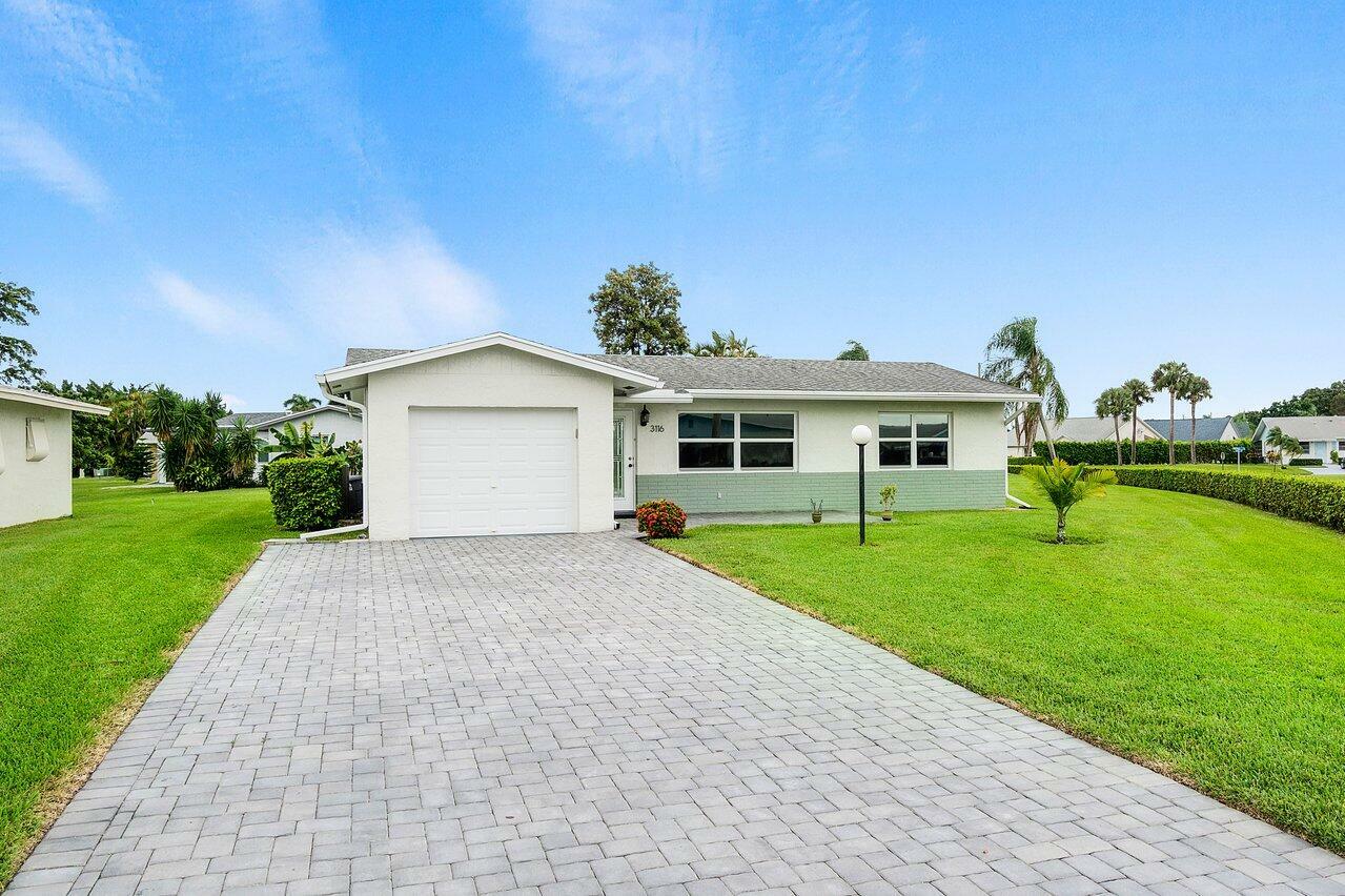 Property Photo: 3116 Maria Circle FL 33417