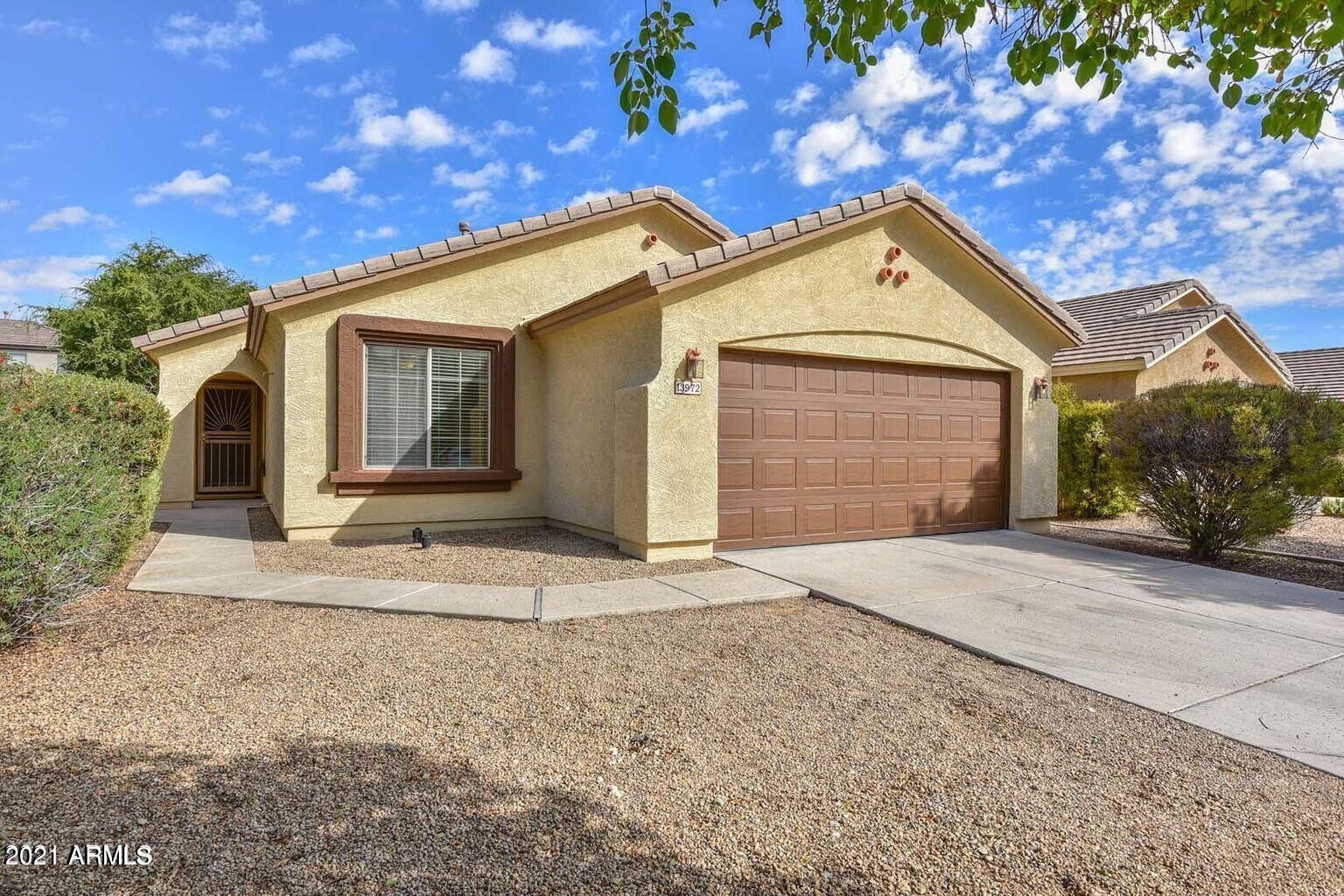 Property Photo: 13972 W Country Gables Drive AZ 85379
