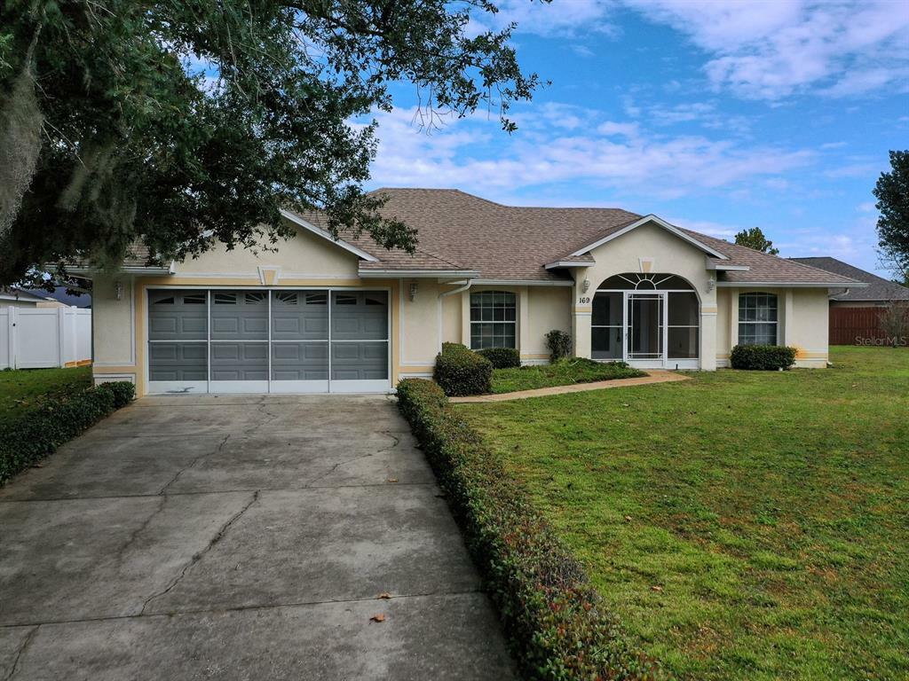 Property Photo:  169 Country Lakes Circle  FL 34736 