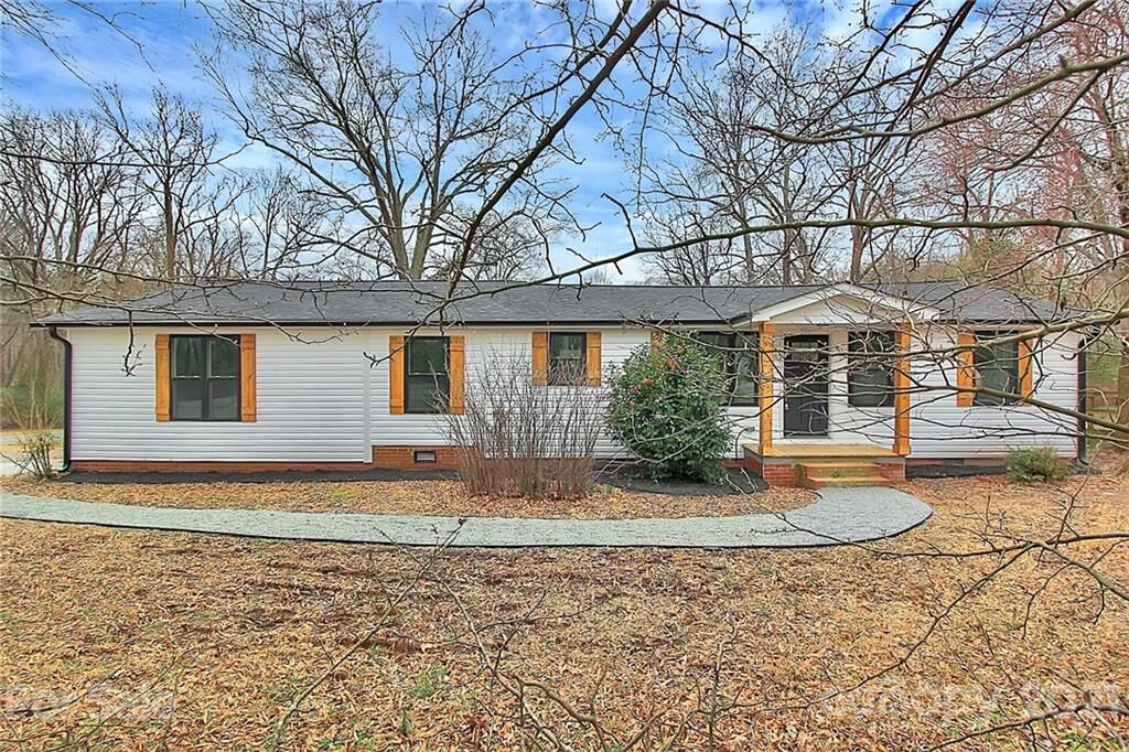 Property Photo:  10118 Idlewild Road  NC 28105 