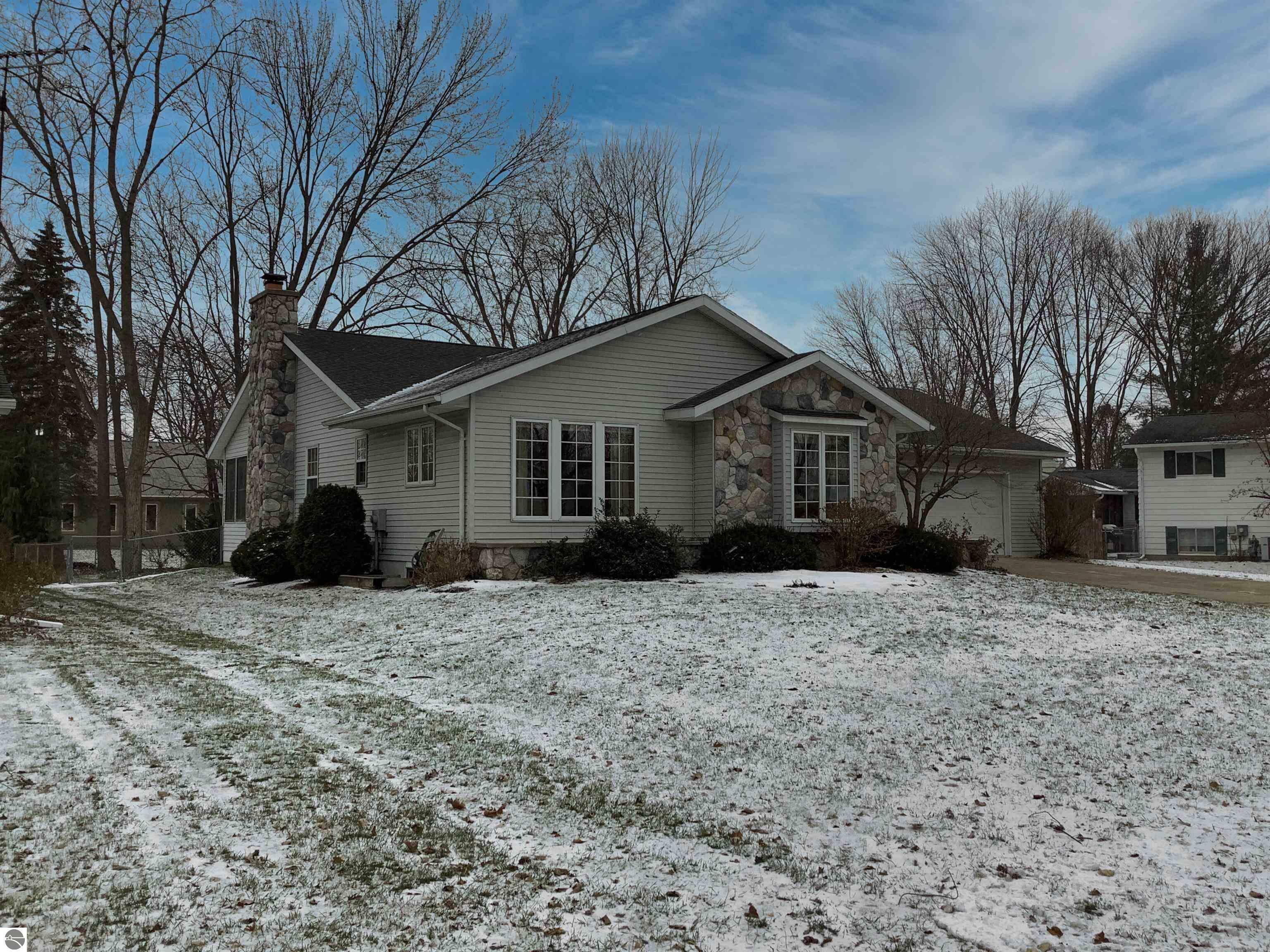 Property Photo:  1411 Andre Court  MI 48858 