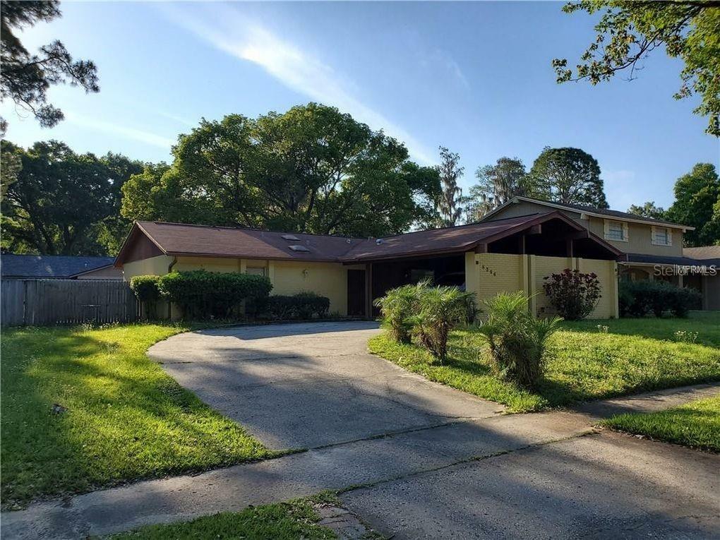 Property Photo:  8206 Greenshire Drive  FL 33634 