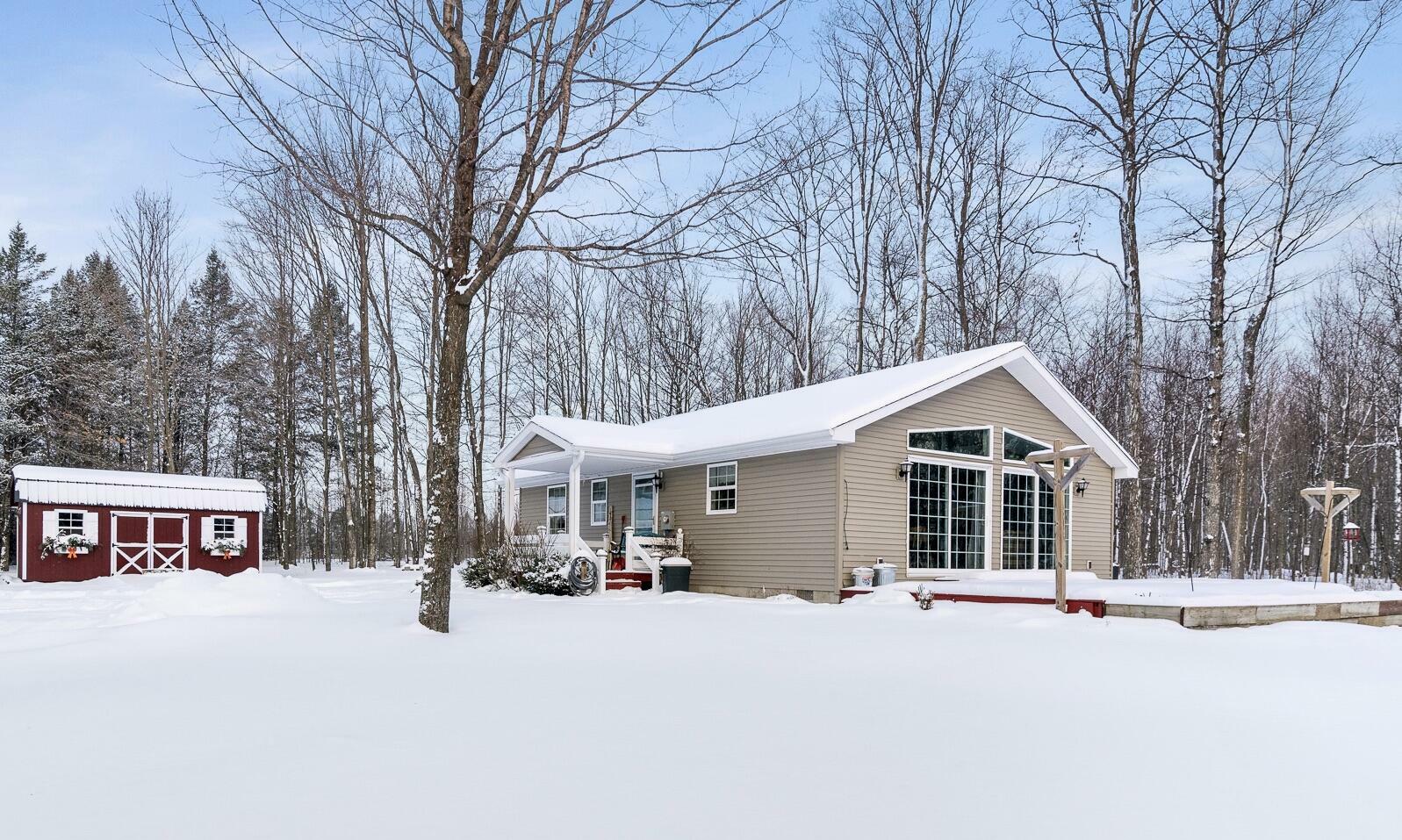 Property Photo:  7715 Woods Homestead Road  MI 49799 