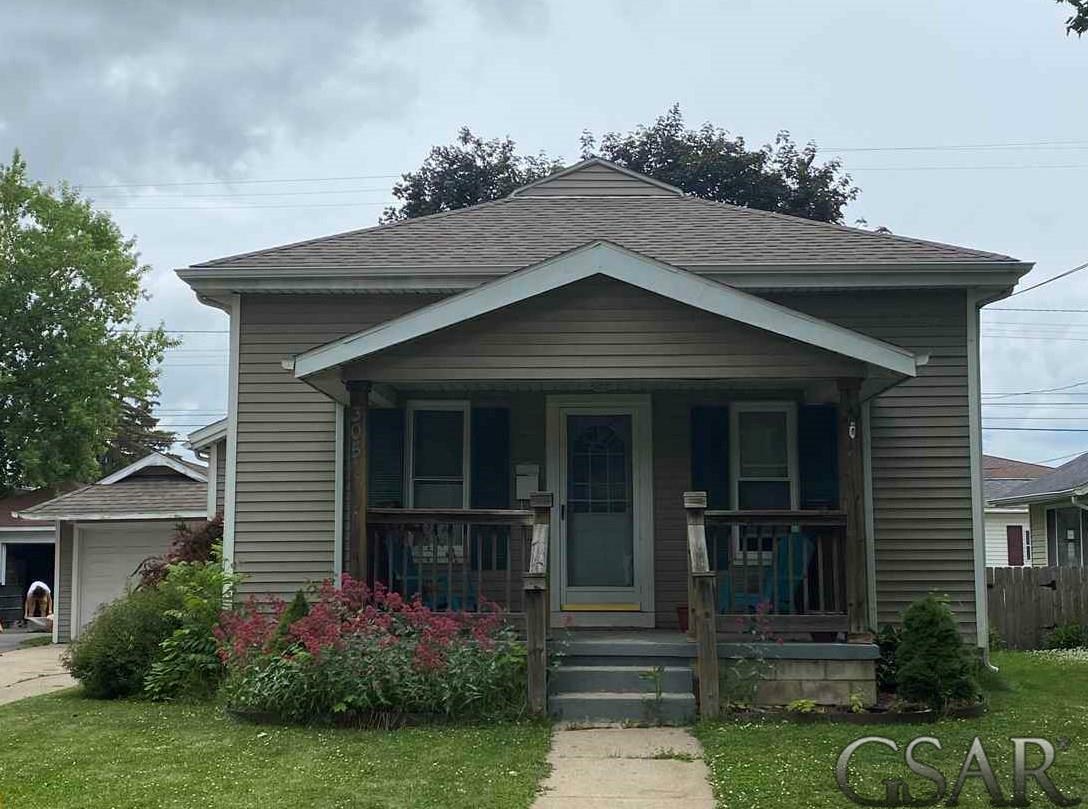 Property Photo:  305 Mercer  MI 48429 