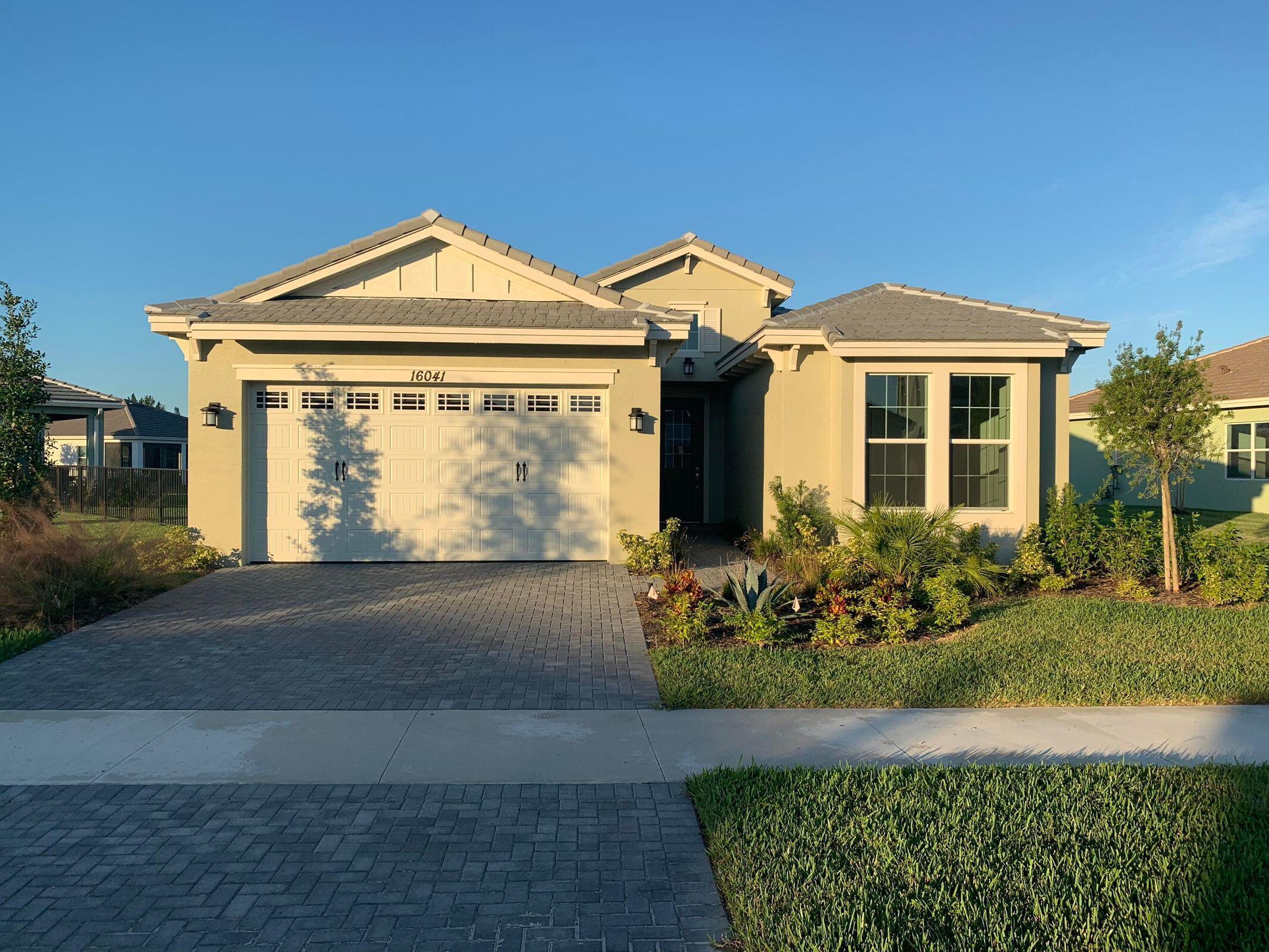 Property Photo:  16041 Rain Lilly Way  FL 33470 