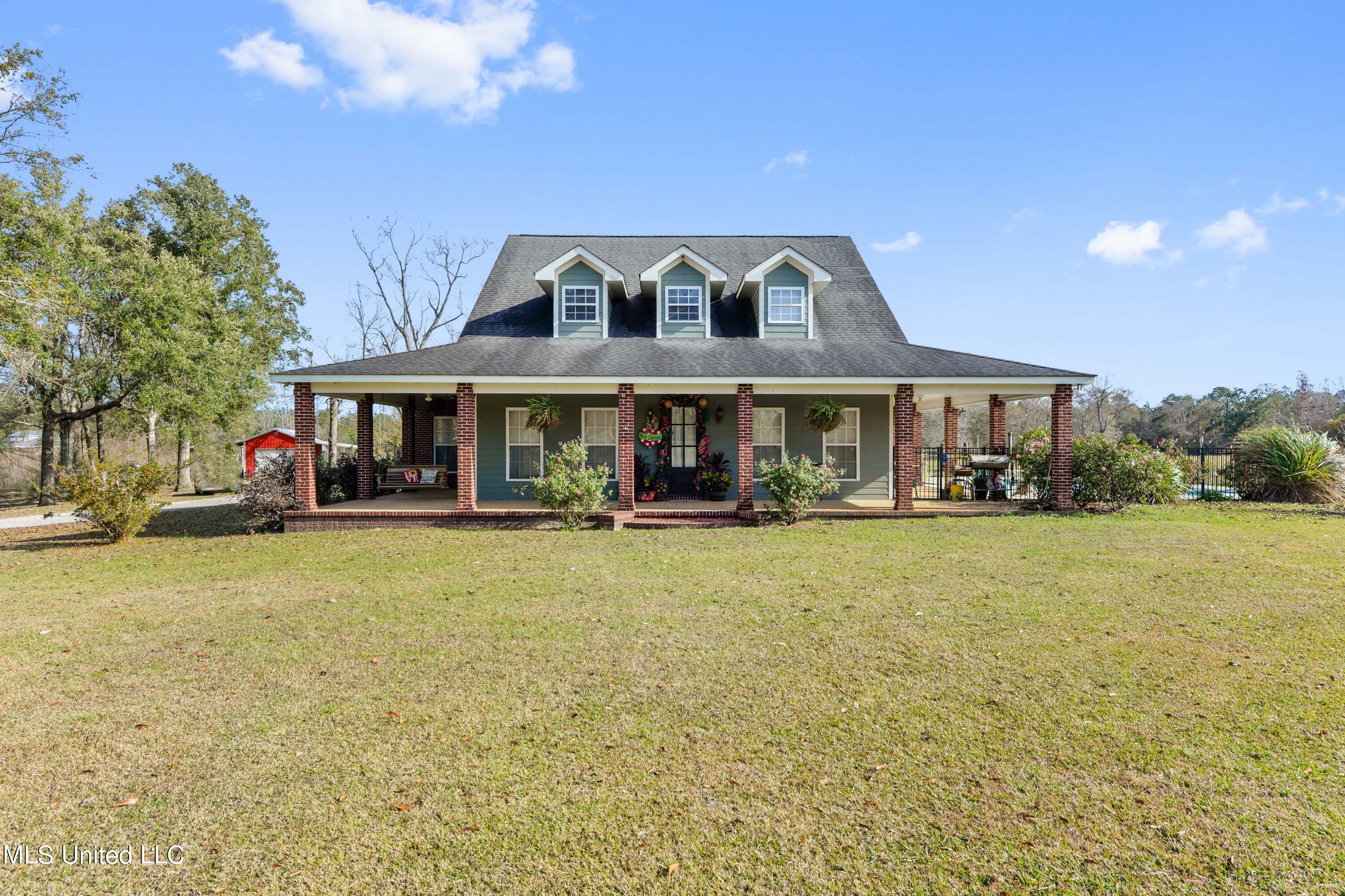 Property Photo:  10020 Wire Road  MS 39565 