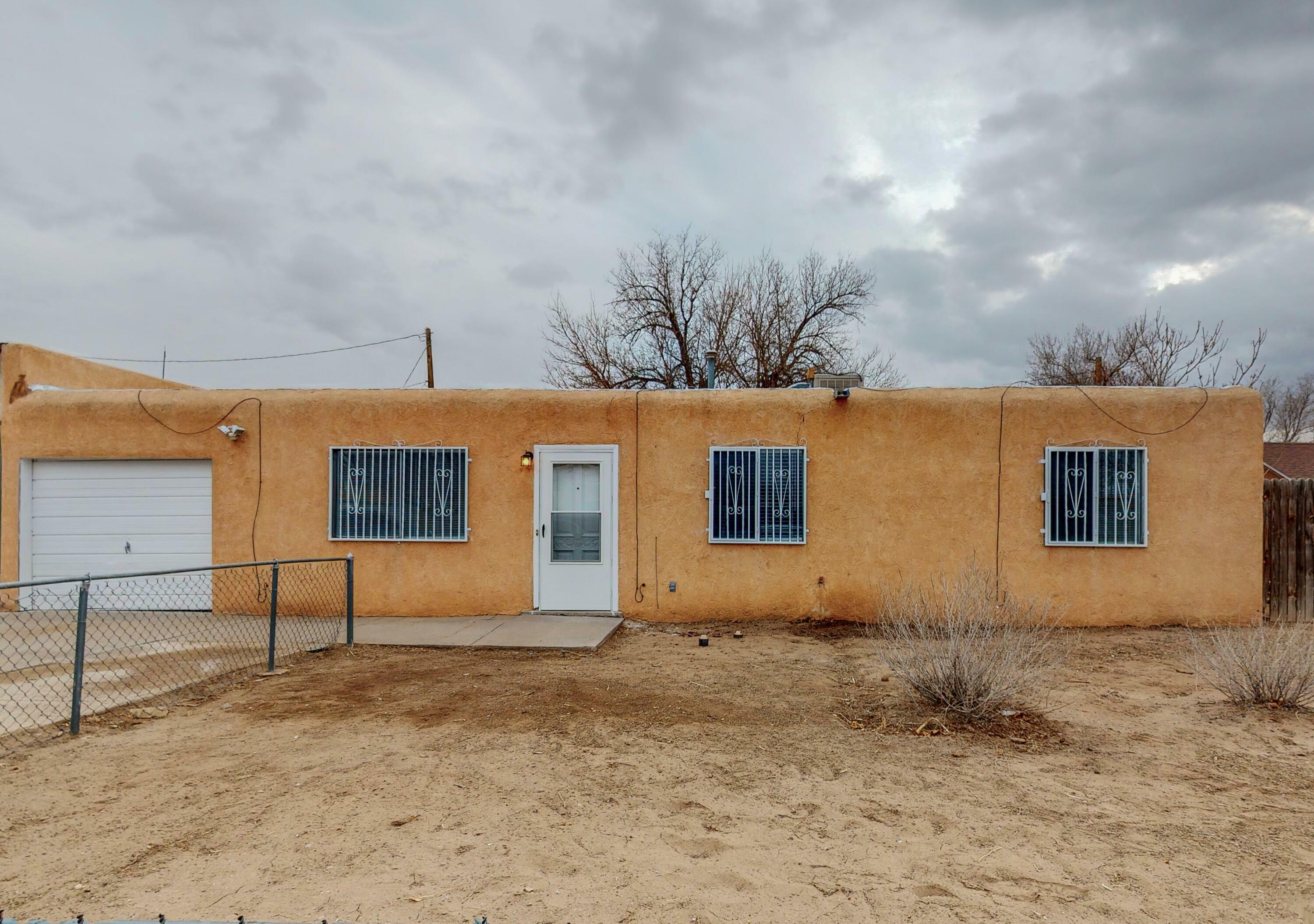 Property Photo:  1212 La Poblana Road NW  NM 87107 