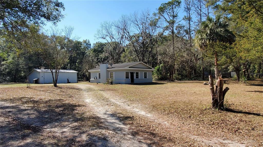 Property Photo:  26213 NW 142nd Avenue  FL 32643 