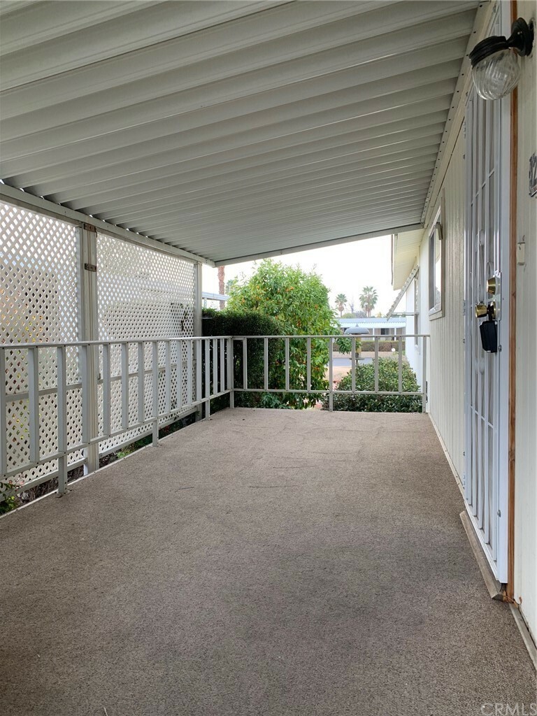 Property Photo:  23820 Ironwood Avenue 126  CA 92557 