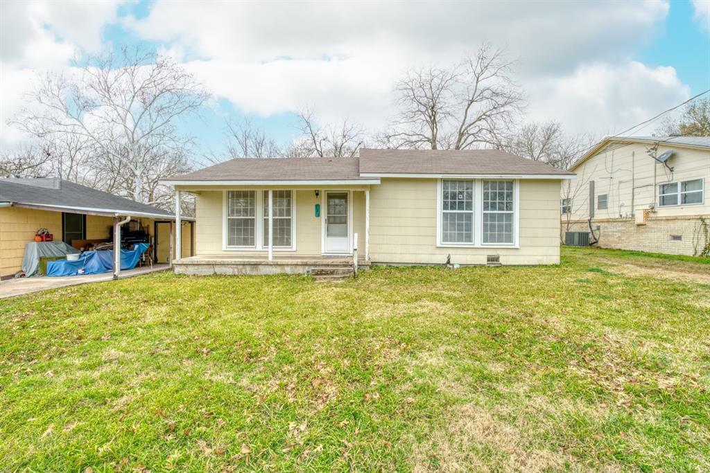 Property Photo:  128 S Harris Street  TX 77418 