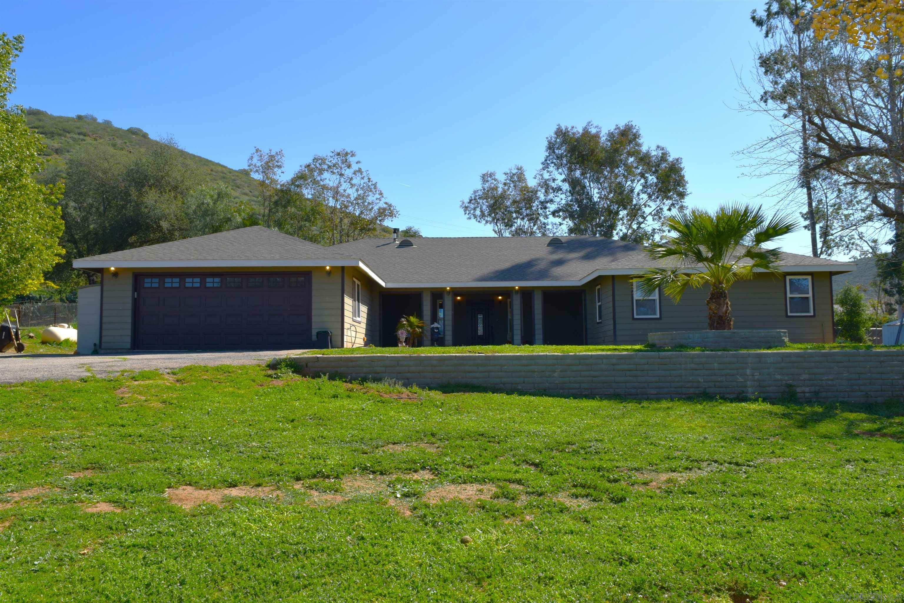 Property Photo:  22545 Casa De Carol  CA 92065 