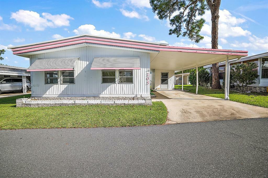 Property Photo:  205 Palm Meadows Drive  FL 32726 