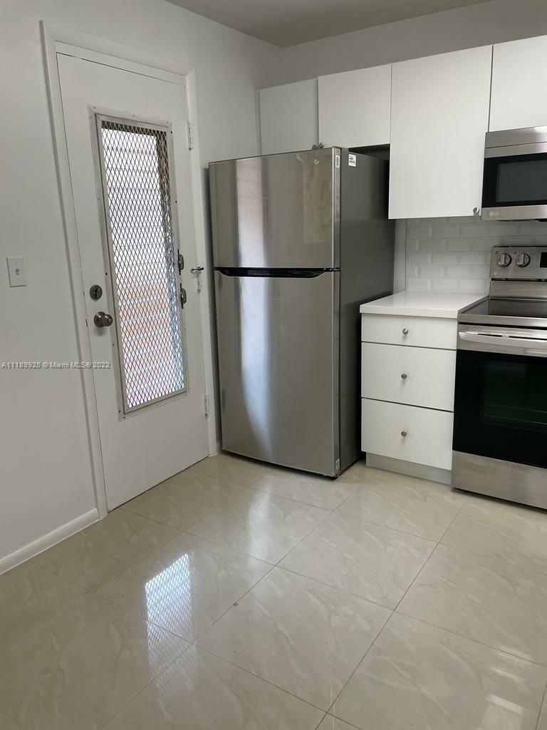 Property Photo:  403 NW 68th Ave 402  FL 33317 