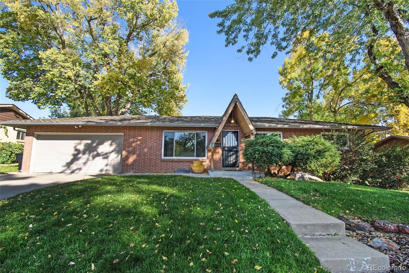 Property Photo: 2874 S Winona Court CO 80236