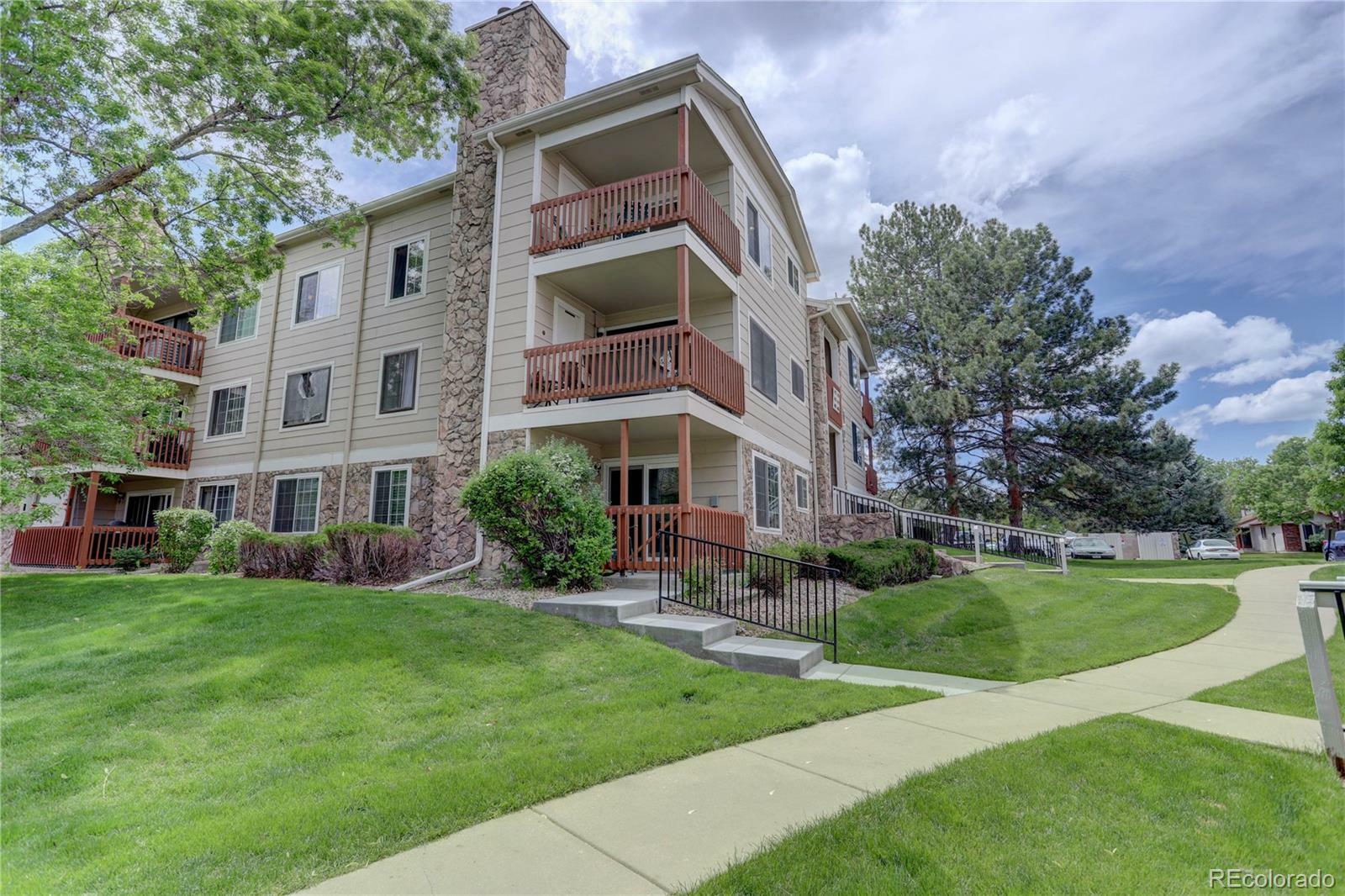 Property Photo: 7680 Depew Street 1423 CO 80003