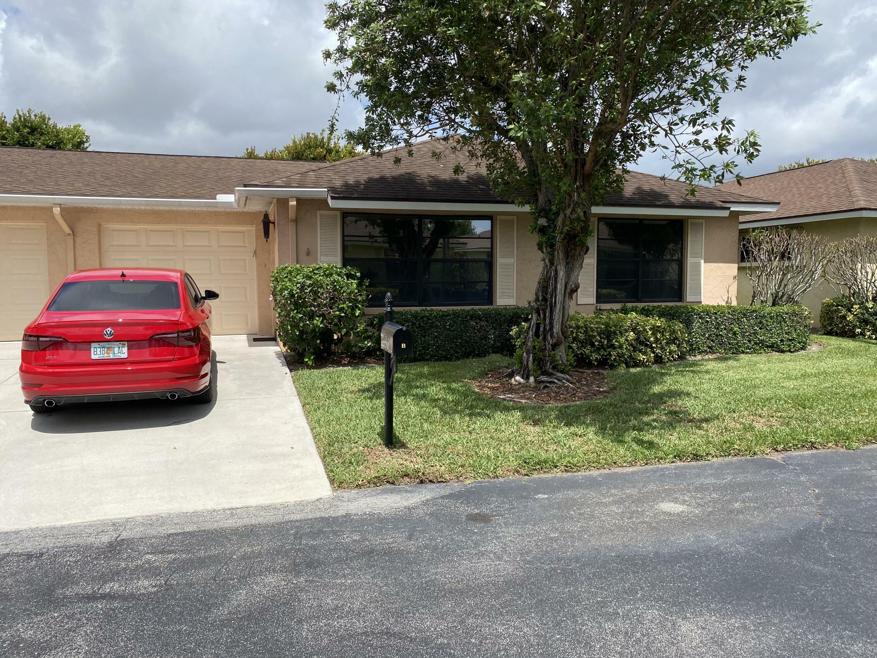 Property Photo:  9975 Orchid Tree Trail B  FL 33436 