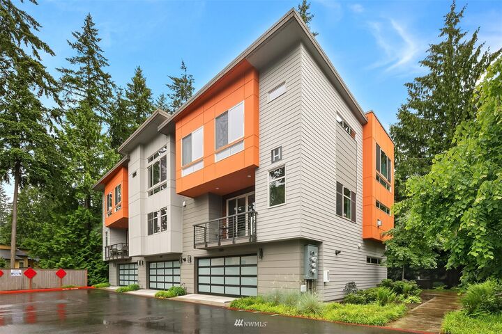 Property Photo:  1593 163rd Place NE H3  WA 98008 