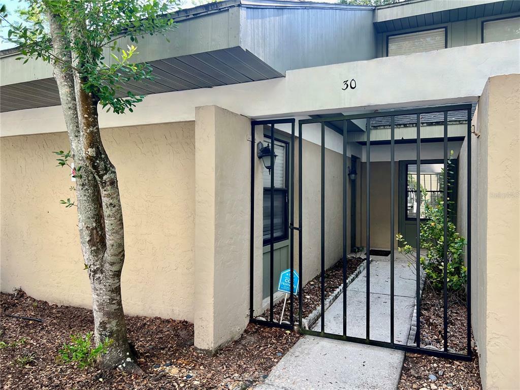 Property Photo:  7200 SW 8th Avenue E30  FL 32607 