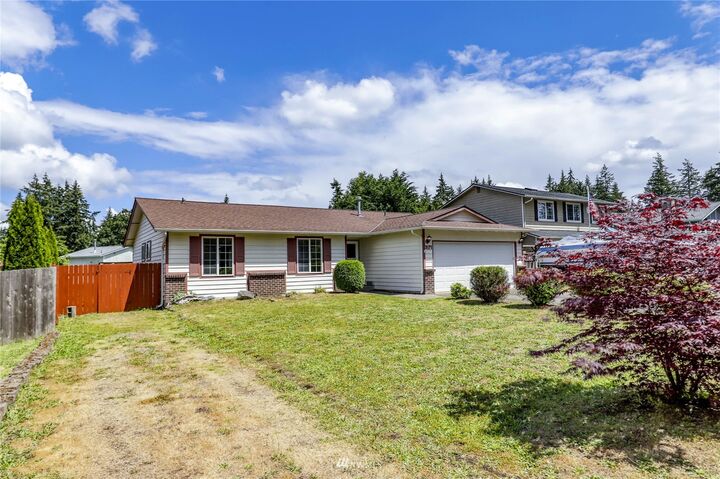 Property Photo: 3171 SE Villa Carmel Drive WA 98366