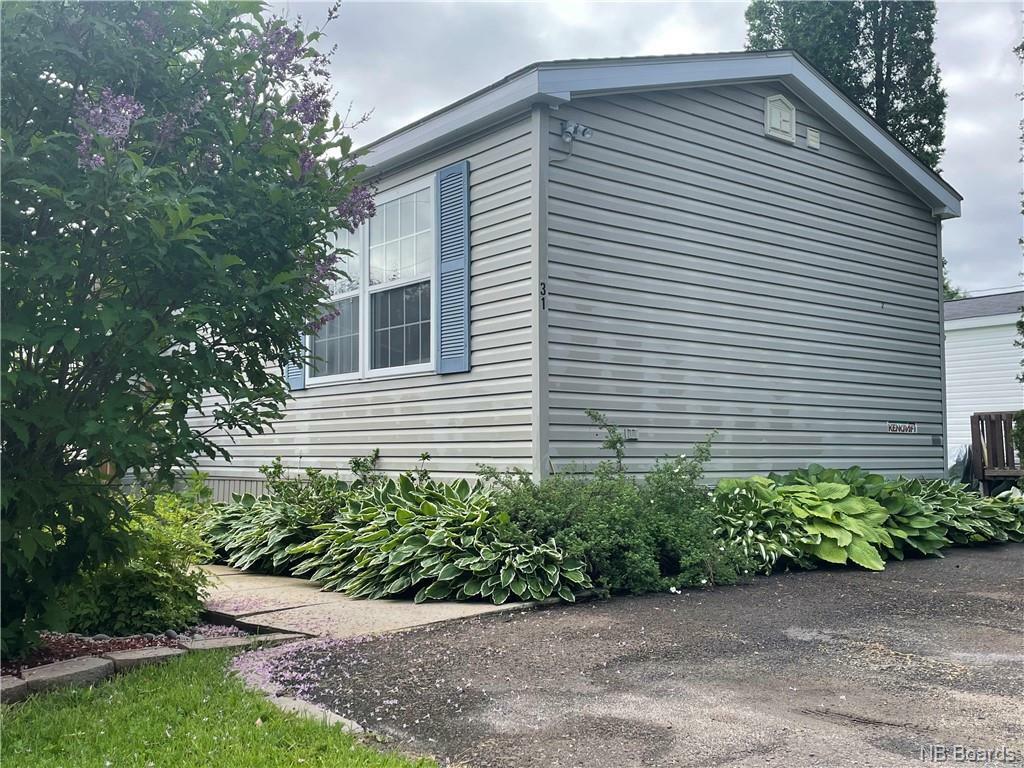 Property Photo: 31 Kellys Drive NB E3B7R2