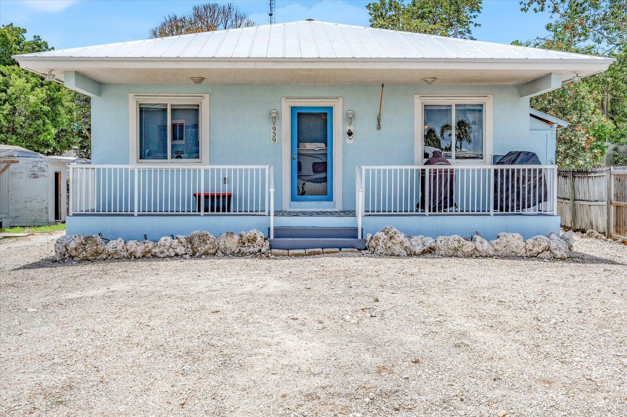 Property Photo:  939 Plantation Road  FL 33037 